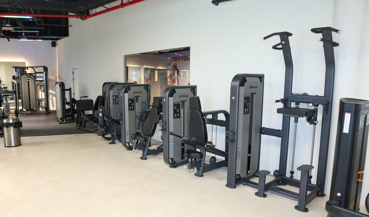A MiFitness-fitted gym floor with Shua strength machines